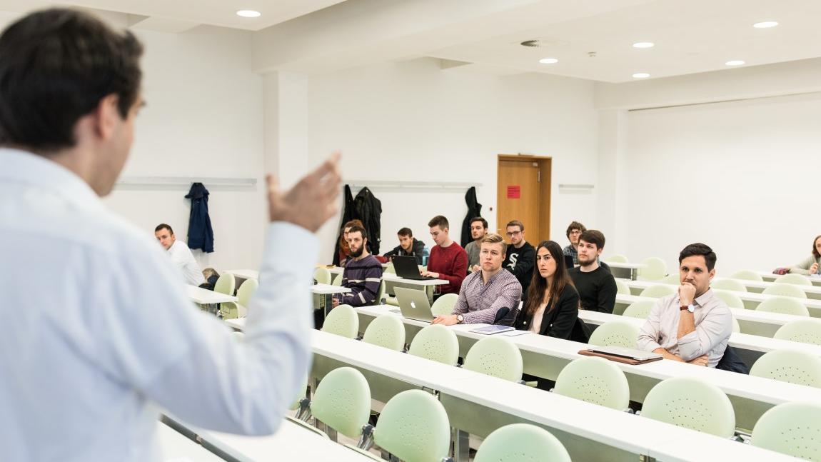 enlarge the image: A lecturer in the Joint International Master's Programme in Sustainable Development teaches a seminar group.