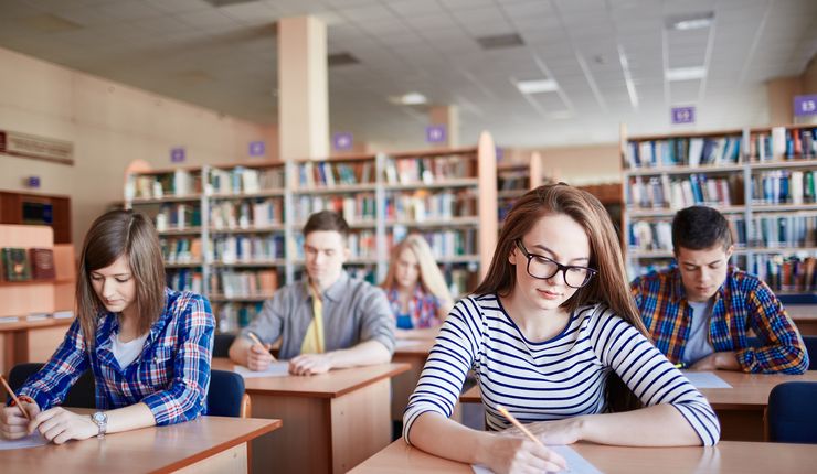 Students write an exam. Photo: Colourbox